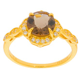 Round brown spinel with moissanite accented gold ring, beautifully designed for elegance and luxury.